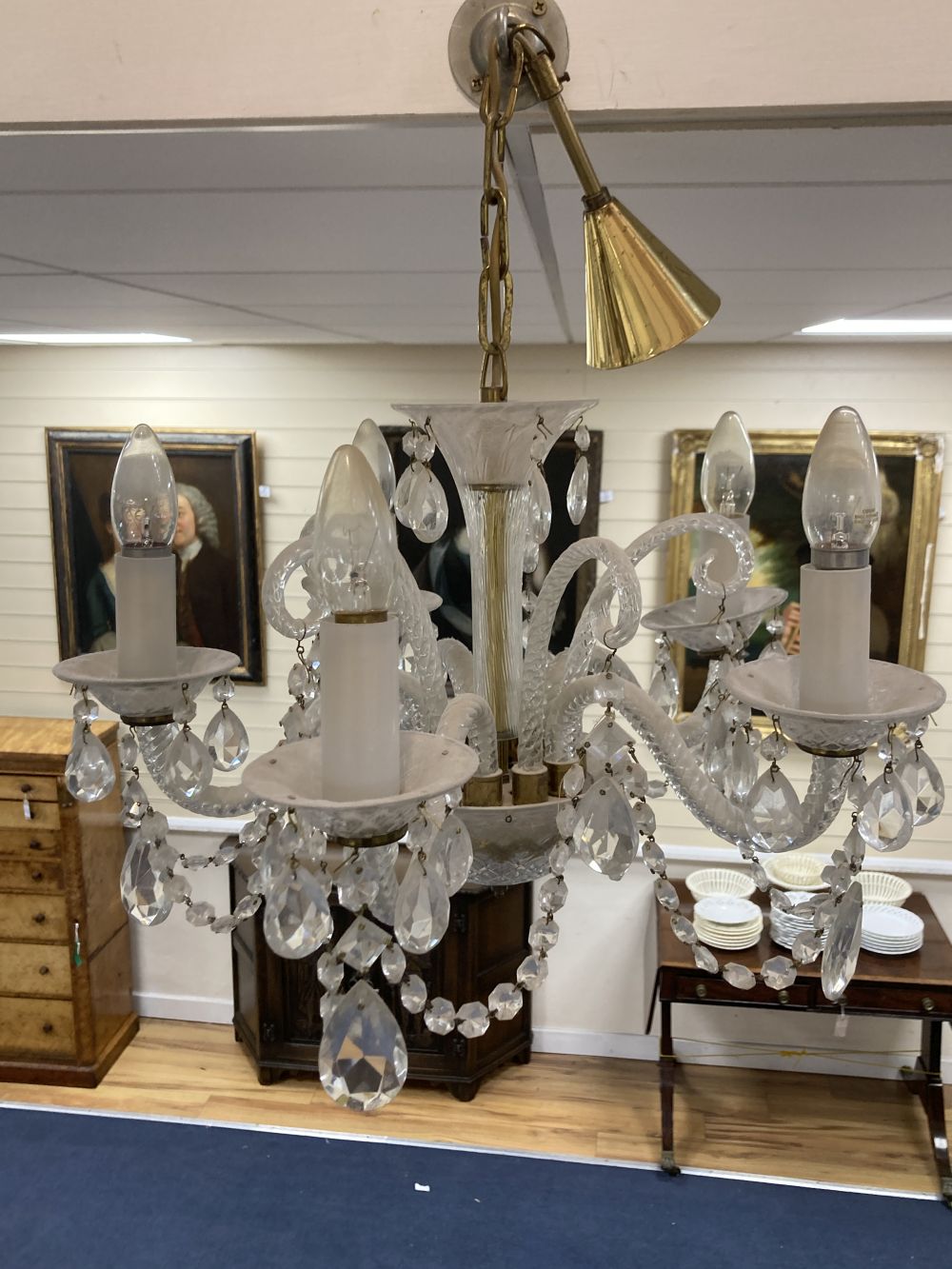A pair of five branch Venetian glass chandeliers, each with cut lustre drops and another similar